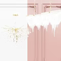 Elegant Brass Framed Chandelier With Crystal Fringe And Decorative Accents On Pink Paneled Wall