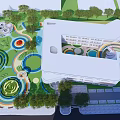 Vibrant Children's Playground With Green Lawns Circular Play Structures Slides Colorful Paths And Trees