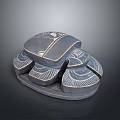 Scarab Shaped Stone Sculpture Carving With Intricate Patterns And Segmented Design