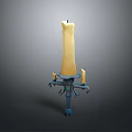 Standing Vintage Metal Candelabra With Three Yellow Candles And Ornate Design