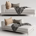 Modern Comfortable Light Toned Chaise Lounge With Beige Gray Pillows And Gray Blanket