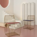 Modern Leisure Chairs With Metal Frame And Red Blue Cushions In Soft Tones Interior