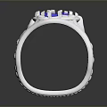 Silver Ring With Blue Gemstones And Intricate Carvings On Band