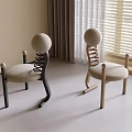 Modern Minimalist Dining Chairs With Spring Back And Light Colored Seat In Bright Room
