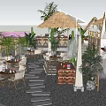 Outdoor Restaurant Dining Area With Thatched Roof String Lights Fountain And Stone Path