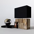 Decorative Ornament Set With Silver Vase Globe Black White Portrait Table Lamp On Metal Table