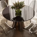 Modern Round Black Glass Top Table and Transparent Chairs Set with Green Vase Plants