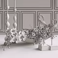 Decorative Ornament Set With White Orchids Silver Swan Figurines Metallic Candle Holders On Black Table