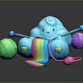 Adorable Blue Cloud Shaped Creature Knitting With Colorful Yarn Balls And Rainbow Yarn