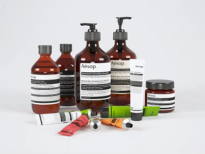 Stylish Bathroom Accessories Including Brown Bottles Pump Dispensers Jars And Tubes 3d model