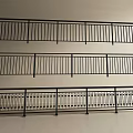 Black Metal Railings With Various Decorative Designs And Patterns