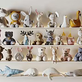 Cute Plush Stuffed Toys Collection on Shelf with Bunny Bear Shark Swan and More