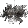 Artistic Modern Chandelier Featuring Intricate Wire Frame and Abstract Feather Shapes