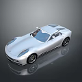 Sleek Silver Two Door Sports Car With Streamlined Body And Alloy Wheels