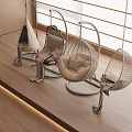 Modern Rattan Hanging Chairs With Metal Frame On Wooden Floor Near Window
