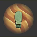 Small Green Hippo Shaped Figurine Placed On Orange Striped Round Base