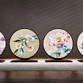 Four Piece Chinese Embroidered Round Decorative Ornament Set with Floral Bird Patterns
