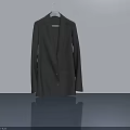Dark Brown Suit Hanging On Hanger Against White Wall With Gray Floor Reflection