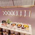 Stylish Hanging Structure Over Shelf With Bowls Cups And Green Plant On Pink Background