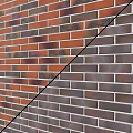 Spliced Red And Gray Brick Wall Structure With Classic Architectural Design