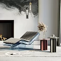Modern Transparent Base Lounge Chair With Gray Cushion Side Table Dried Flowers And Fireplace