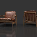Two Views Of Brown Leather Single Sofa With Wooden Frame And Vintage Design