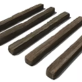 Six Dark Colored Stone Wood Long Strips With Textured Surface Neatly Arranged On Light Background