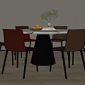 Modern Round Marble Top Dining Table Set With Multi Colored Chairs And Decorative Vase 3d model