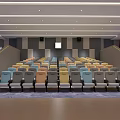 Modern Cinema Auditorium Interior With Colorful Seats Stadium Seating And Large Screen