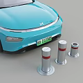 Road Facilities With Red And White Striped Traffic Bollards Next To Blue Car