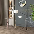 Modern Floor Lamps With Round White Shades In Interior With Green Plant And Wooden Floor