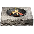 Two Outdoor Fire Pits With Natural Rock Base And Burning Flames