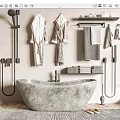 Concrete Bathtub In Modern Bathroom With Hanging Bathrobes Towels And Shower Fixtures