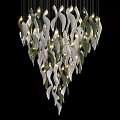Modern Chandelier With White And Green Leaf Shaped Decorations And Illuminated Bulbs
