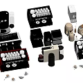 Various Modern Kitchen Appliances Including Coffee Machines And Capsules