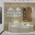 White Layered Display Shelves With Vases And Small Ornaments On Textured Wall