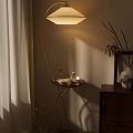 Elegant Modern Floor Lamp With Golden Stand Small Table And Warm Lighting Decor