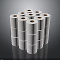 Neatly Stacked White Paper Rolls With Orange Cores On Gray Reflective Background
