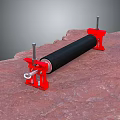 Hardware Tools Black Roller With Red Brackets And Metal Components On Rock Surface