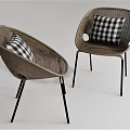 Two Woven Rattan Leisure Chairs with Black Legs and Black White Checkered Cushions