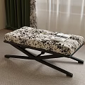 Floral Patterned Fabric Sofa Bench With Black Cross Legs And Magazine On Top