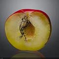 Fresh Halved Peach Showing Juicy Yellow Flesh And Red Skin
