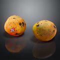 Fresh Ripe Mangoes With Spotted Yellow Skin And Sticker On Black Background With Reflections