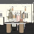 Elegant Clothing Store Interior With Beige Walls Clothing Racks Mannequins And Plants