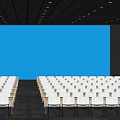 Modern Conference Room With Arranged Rows Of Chairs Large Screen And Dark Walls