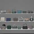 Various Stylish Handbags In Different Colors Neatly Displayed On White Shelves