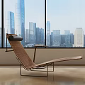 Modern Lounge Chair With Wicker Design And Metal Frame By Window Overlooking City Skyline