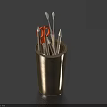 Pens Arranged In Metal Pen Holder With Orange Scissors On Blue Background