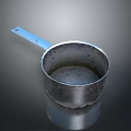 Vintage Metal Measuring Cup With Long Handle And Worn Surface For Kitchen Use