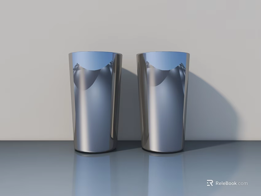 Public Facilities Area With Two Silver Metal Cups Featuring Wave Patterns On Smooth Surface 3d model 